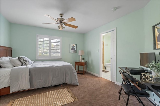 carpeted bedroom with connected bathroom, a ceiling fan, and baseboards