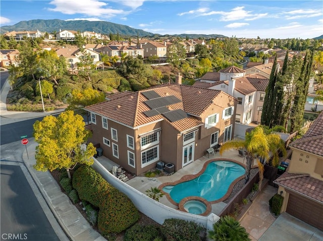 birds eye view of property featuring a residential view and a mountain view