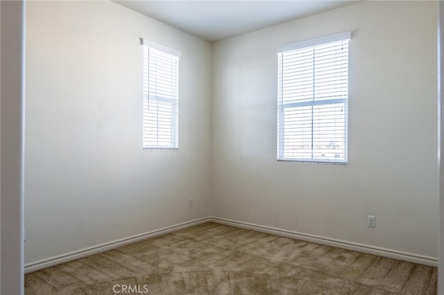 unfurnished room with carpet