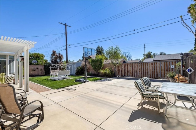 view of patio with a fenced backyard, outdoor dining area, and a pergola