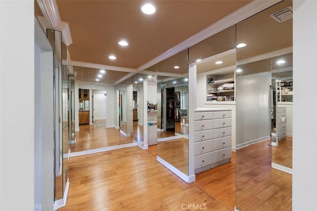 walk in closet featuring visible vents and light wood-style floors