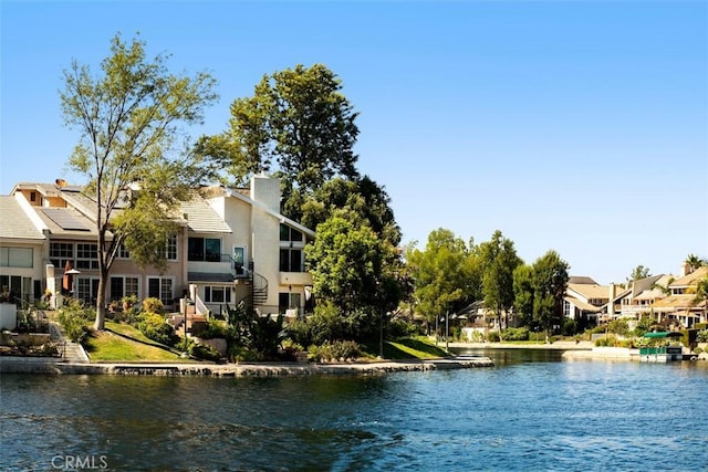 property view of water featuring a residential view