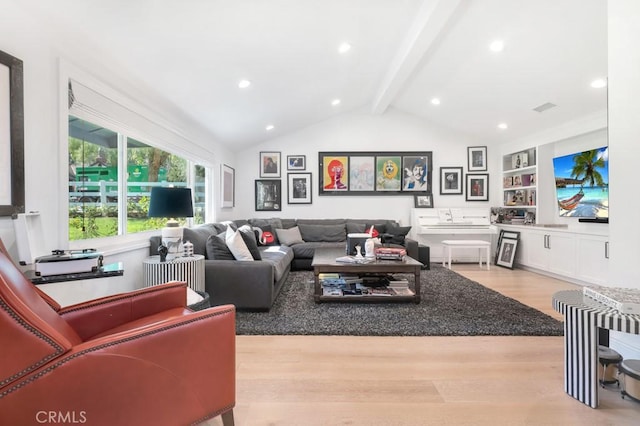 living area with vaulted ceiling with beams, wood finished floors, visible vents, and recessed lighting