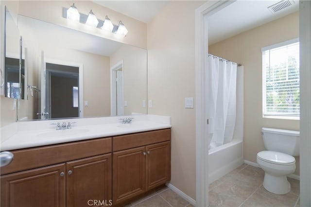 full bath with double vanity, visible vents, toilet, a sink, and tile patterned flooring