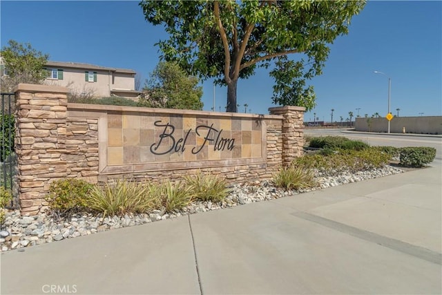 view of community sign