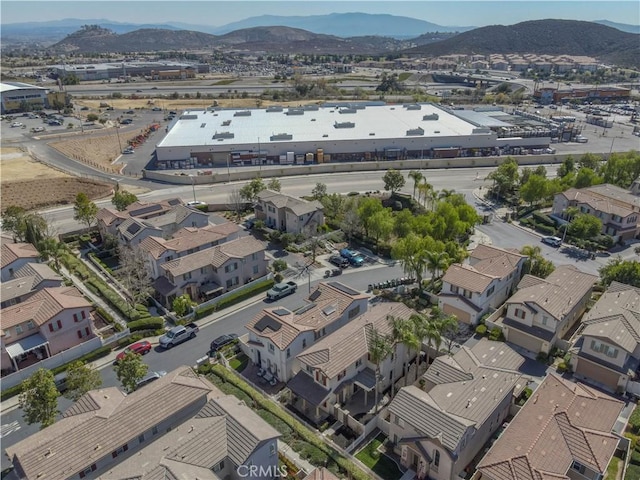 drone / aerial view with a residential view and a mountain view