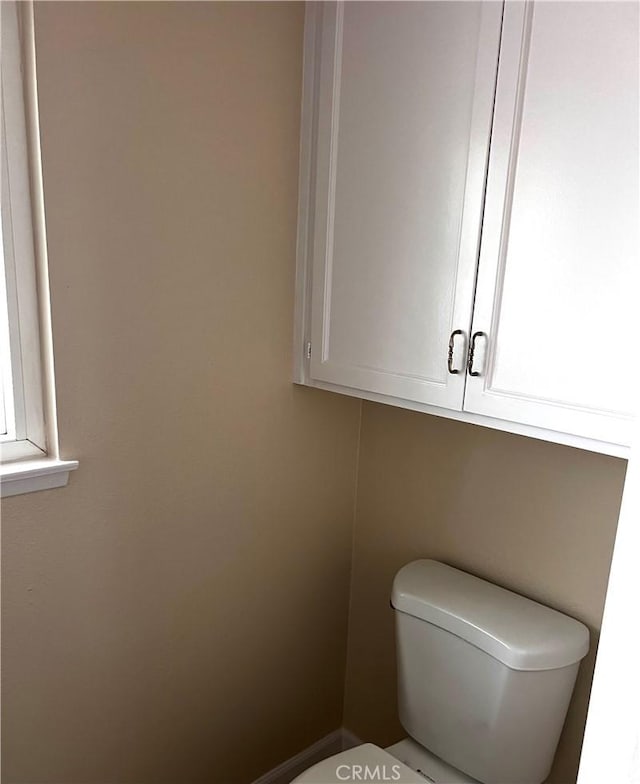 bathroom featuring toilet