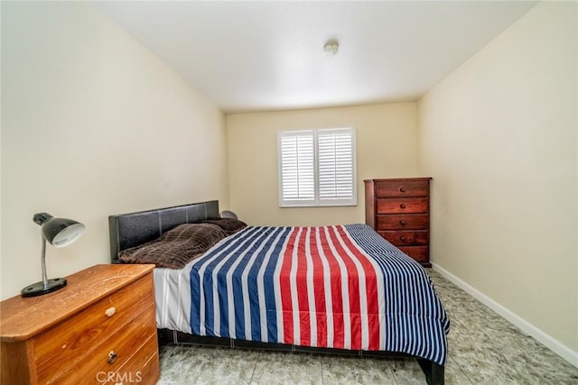 bedroom with baseboards