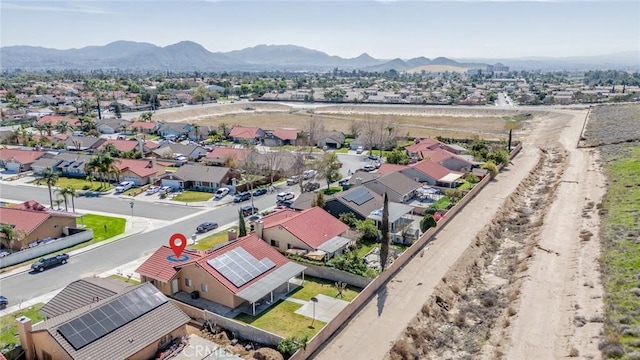 bird's eye view with a residential view and a mountain view