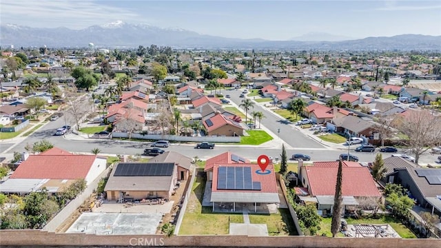 bird's eye view featuring a residential view and a mountain view