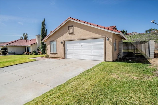 view of front facade with a garage, a tile roof, concrete driveway, stucco siding, and a front lawn