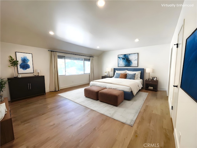 bedroom featuring light wood-style floors, recessed lighting, vaulted ceiling, and baseboards