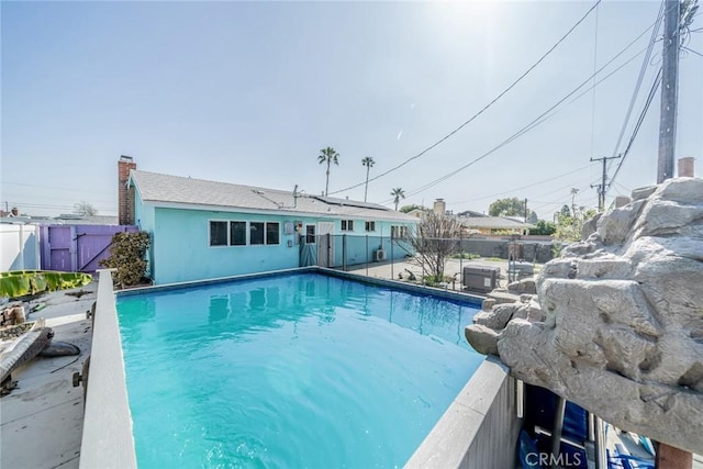 view of pool with a fenced in pool and a fenced backyard