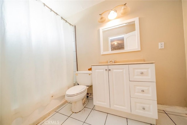 bathroom featuring a shower with curtain, vanity, toilet, and tile patterned floors