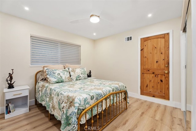 bedroom with light wood-type flooring, recessed lighting, baseboards, ceiling fan, and visible vents