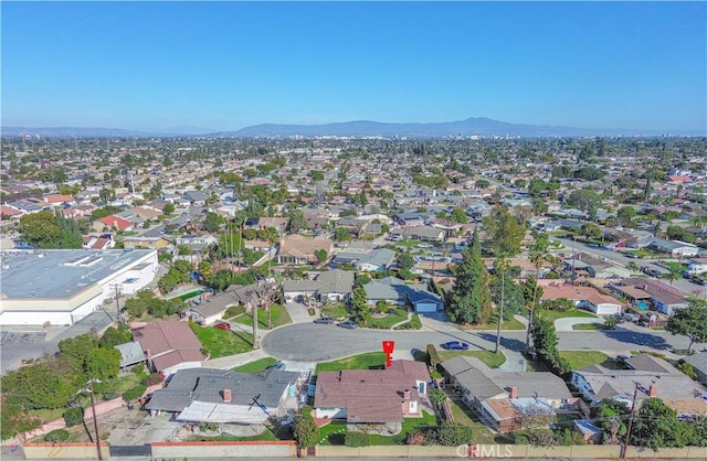 bird's eye view featuring a mountain view and a residential view