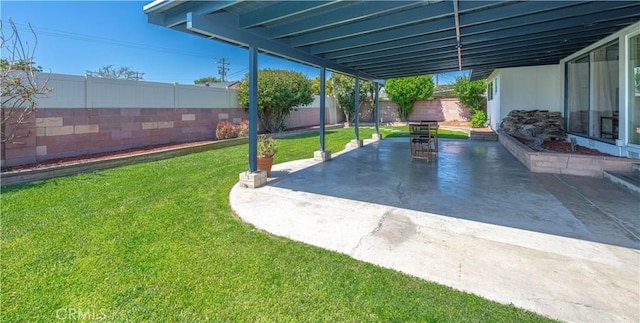view of yard with a patio and a fenced backyard