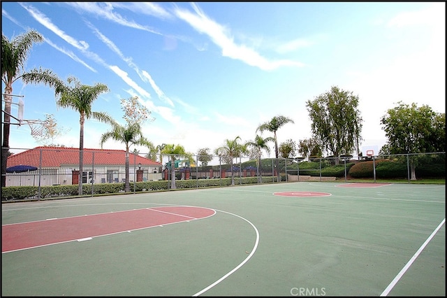 view of sport court with community basketball court and fence