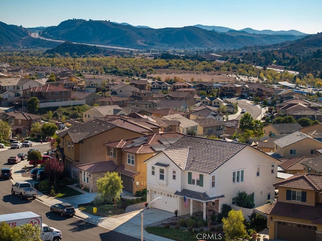 bird's eye view with a residential view and a mountain view