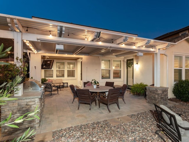 view of patio with outdoor dining area and a pergola