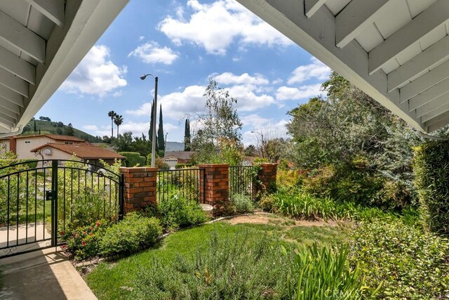 view of yard featuring a gate