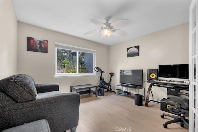 office space featuring ceiling fan and wood finished floors