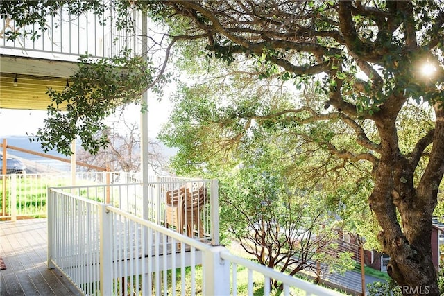 view of wooden balcony featuring a wooden deck