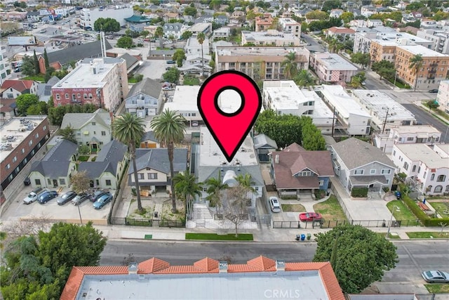 birds eye view of property with a residential view