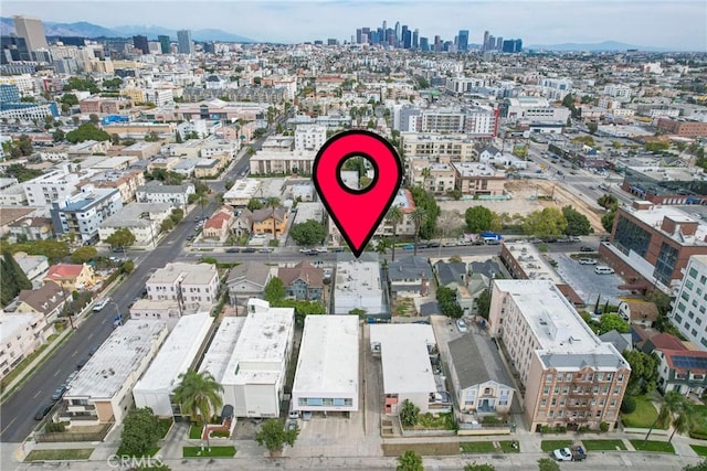 birds eye view of property featuring a city view