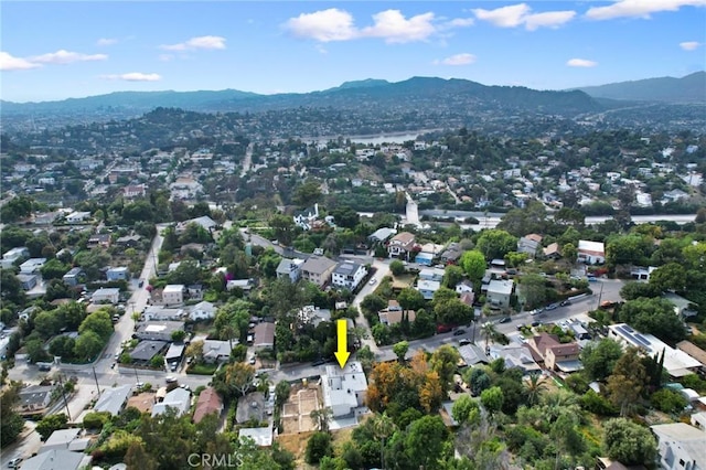 birds eye view of property with a residential view and a mountain view