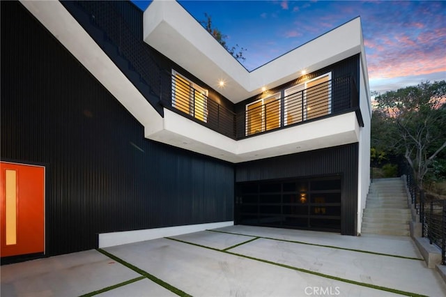 interior space featuring a balcony and an attached garage