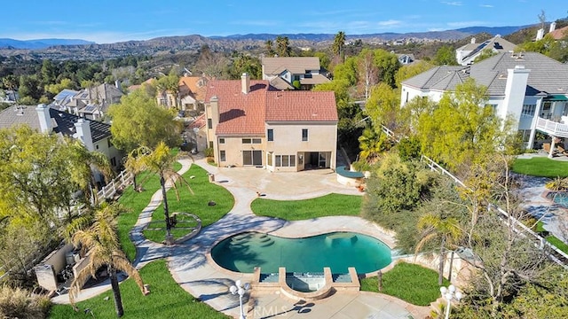 aerial view with a residential view and a mountain view