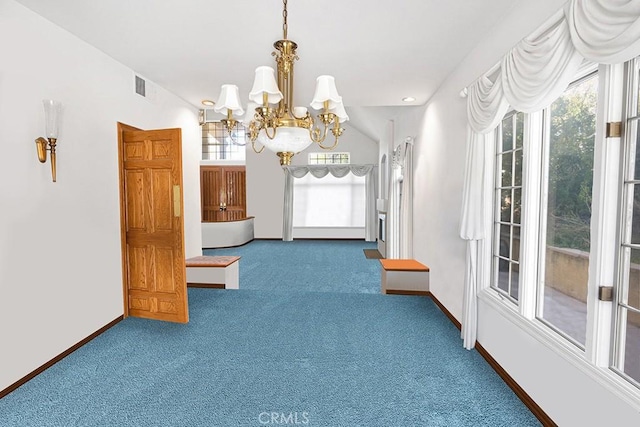 interior space with carpet, visible vents, and plenty of natural light