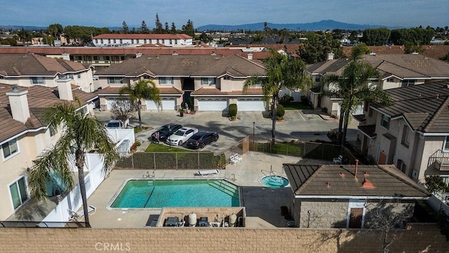 birds eye view of property featuring a residential view and a mountain view