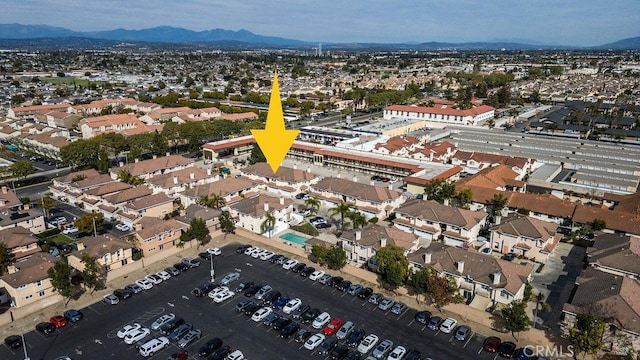 aerial view featuring a residential view and a mountain view