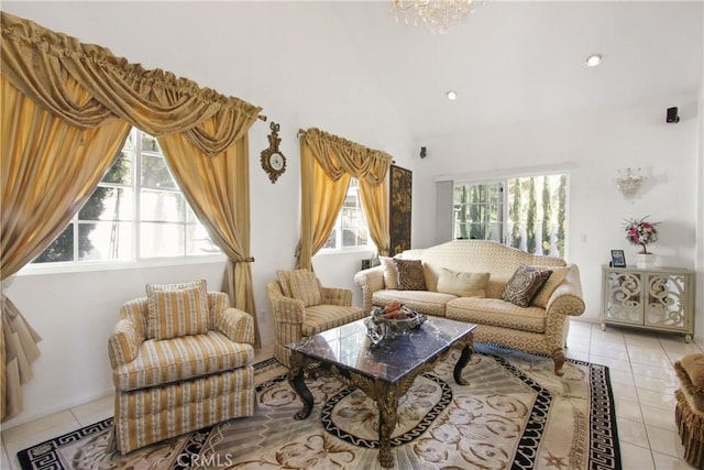 living room with vaulted ceiling, light tile patterned flooring, a wealth of natural light, and recessed lighting