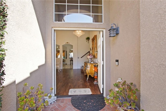 property entrance featuring stucco siding