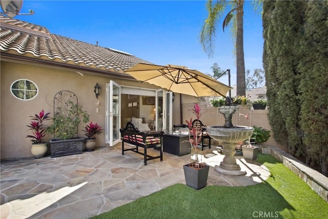 view of patio / terrace with fence