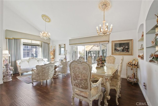 dining room featuring a chandelier, wood finished floors, lofted ceiling, and a healthy amount of sunlight