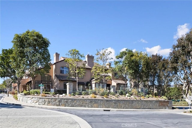 view of front of home featuring stucco siding