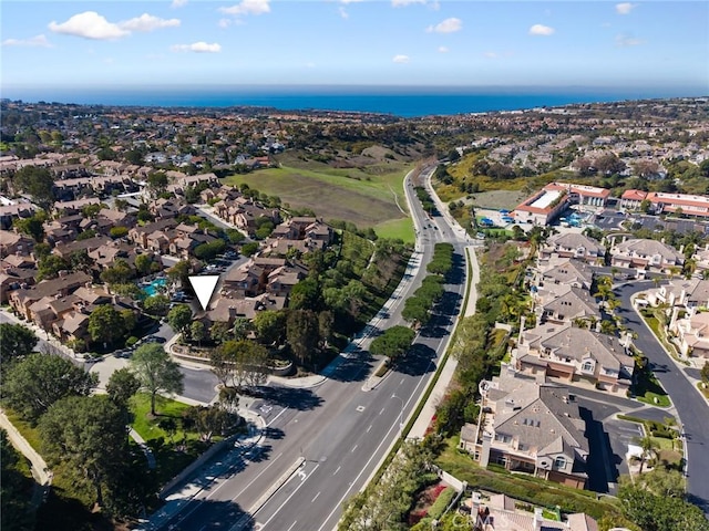 aerial view featuring a water view and a residential view