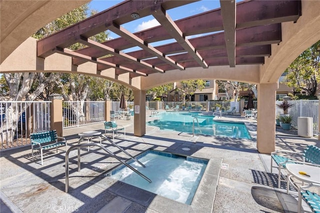 community pool featuring a patio area, fence, and a pergola