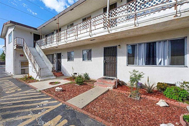 210 N Eucalyptus Ave, Inglewood, CA 90301 - doorway to property with stucco siding