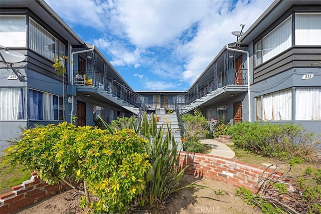 view of property's community featuring stairs