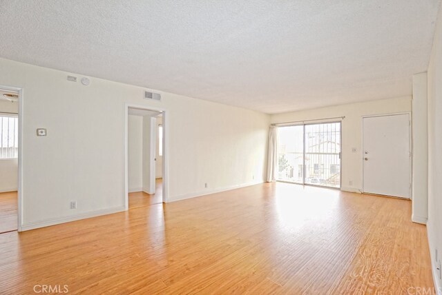 933 New Depot St Unit 6 & 7, Los Angeles, CA 90012 - empty room featuring light wood-style flooring and baseboards