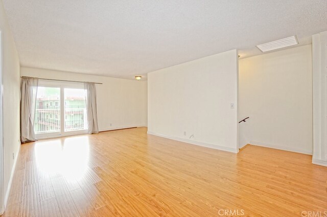 933 New Depot St Unit 6 & 7, Los Angeles, CA 90012 - spare room with light wood-type flooring and baseboards