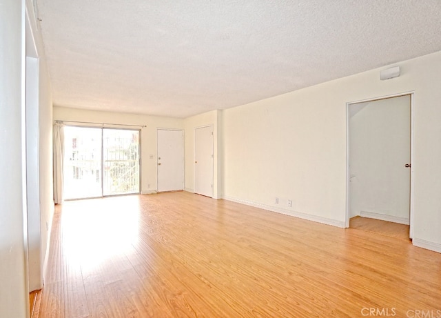 933 New Depot St Unit 6 & 7, Los Angeles, CA 90012 - empty room with light wood finished floors and baseboards