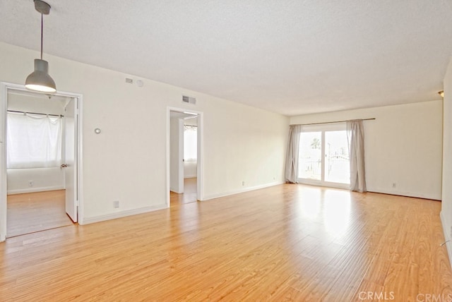 933 New Depot St Unit 6 & 7, Los Angeles, CA 90012 - empty room featuring light wood-type flooring and baseboards