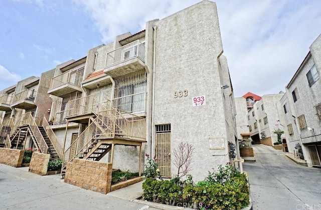 view of building exterior with stairway