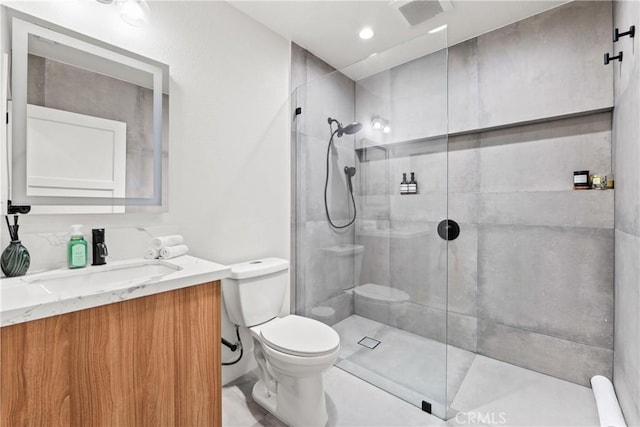 full bath with toilet, walk in shower, and vanity